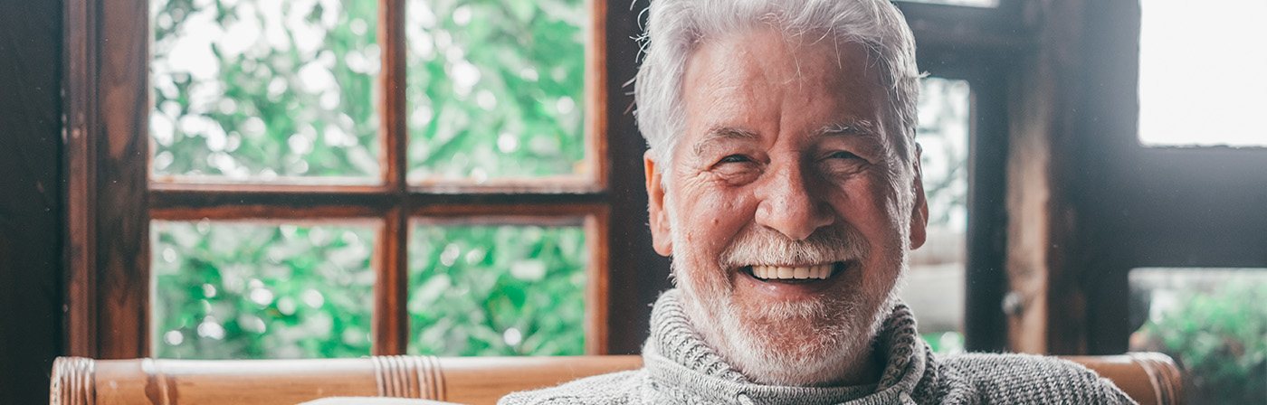 Closeup of senior man smiling at home