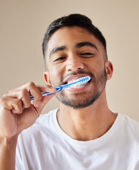 Man brushing his teeth